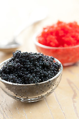 Image showing red and black caviar in bowl