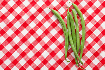 Image showing bean pods on checkered background