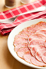 Image showing slices of fresh salami