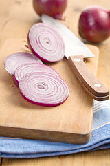 Image showing sliced red onion in kitchen