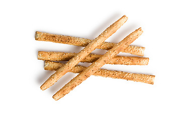 Image showing grissini sticks with sesame seeds