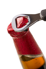 Image showing opening beer cap