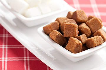 Image showing brown and white cubes of sugar