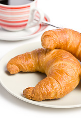 Image showing fresh croissant with coffee