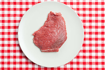 Image showing raw beef steak on plate