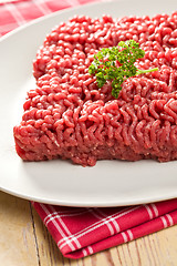 Image showing raw minced meat on kitchen table