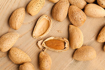 Image showing almonds in nutshell