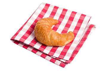 Image showing fresh croissants on checkered napkin