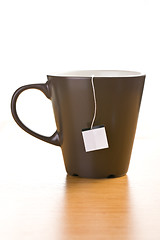 Image showing cup of tea with blank label