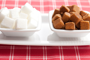 Image showing brown and white cubes of sugar