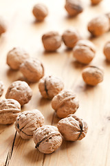 Image showing walnuts on wooden table