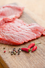 Image showing raw beef steak and chilli pepper