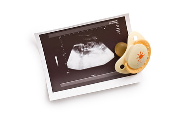 Image showing ultrasound photo with pacifier