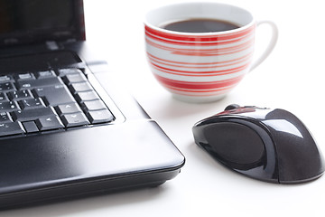 Image showing computer mouse and coffee cup