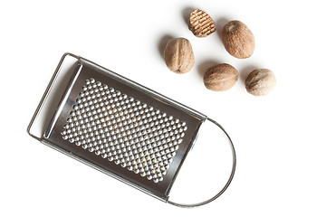 Image showing grind nutmeg with grinder