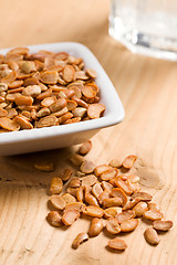 Image showing roasted soya beans on wooden table