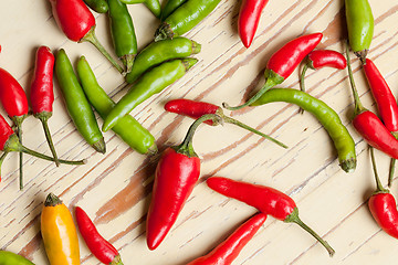 Image showing red and green hot peppers