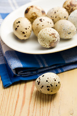 Image showing quail eggs on kitchen table