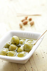 Image showing the green olives in ceramic bowl