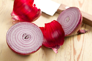 Image showing sliced red onion in kitchen