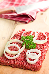 Image showing raw minced meat on kitchen table