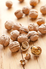 Image showing walnuts on wooden table