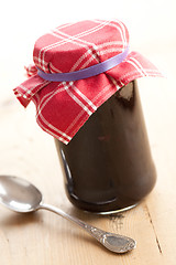 Image showing fruity jam in glass jar