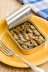 Image showing smoked mussels in opened tin can