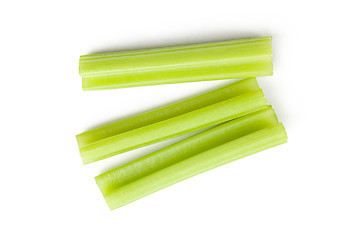 Image showing green celery sticks on white background