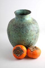 Image showing Persimmon with vase