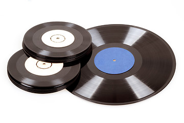 Image showing black vinyl records isolated on white 
