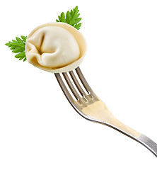 Image showing dumplings on a fork