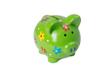Image showing Green piggy bank or money box isolated on a white studio background.
