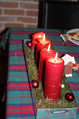 Image showing Candles in red
