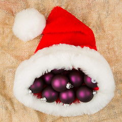 Image showing Santas hat filled with Christmas balls