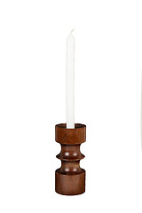 Image showing Old antique wooden candlestick candleholder with vintage candle