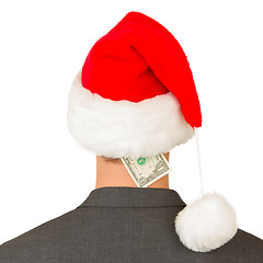 Image showing Business man with a santa hat, santa's crisis budget