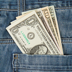 Image showing Macro shot of trendy jeans with american four different dollar b