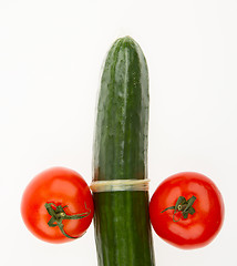 Image showing Tomatoes and cucumber in a condom