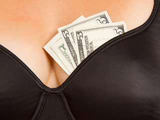 Image showing Concept - woman with cash in a bra