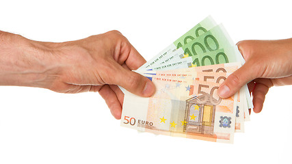 Image showing Man giving 450 euro to a woman