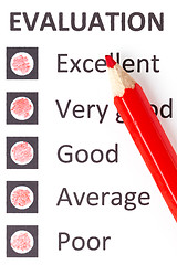 Image showing Red pencil on an evaluationform