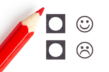 Image showing Red pencil choosing the right smiley