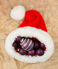 Image showing Santas hat filled with Christmas balls