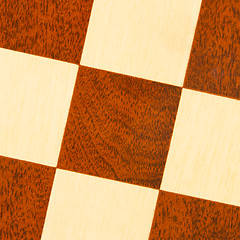 Image showing Very old wooden chess board, isolated
