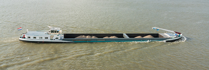 Image showing Ship with loose cargo sailing in the port of Rotterdam (Holland)