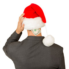 Image showing Business man with a santa hat, santa's crisis budget