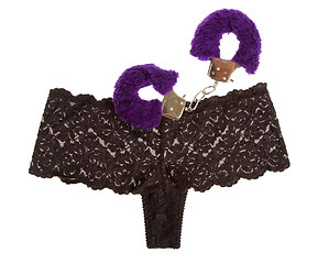 Image showing Fluffy purple handcuffs and panties, prostitution