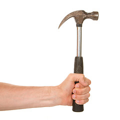 Image showing Man holding a old metal hammer