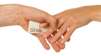 Image showing Man secretly giving 50 euro to a woman
